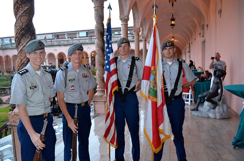 Sarasota Military Academy students Austin Moriarty, Judson Haggard, Jacob Howell and Carl Goodrich wait to present flags.