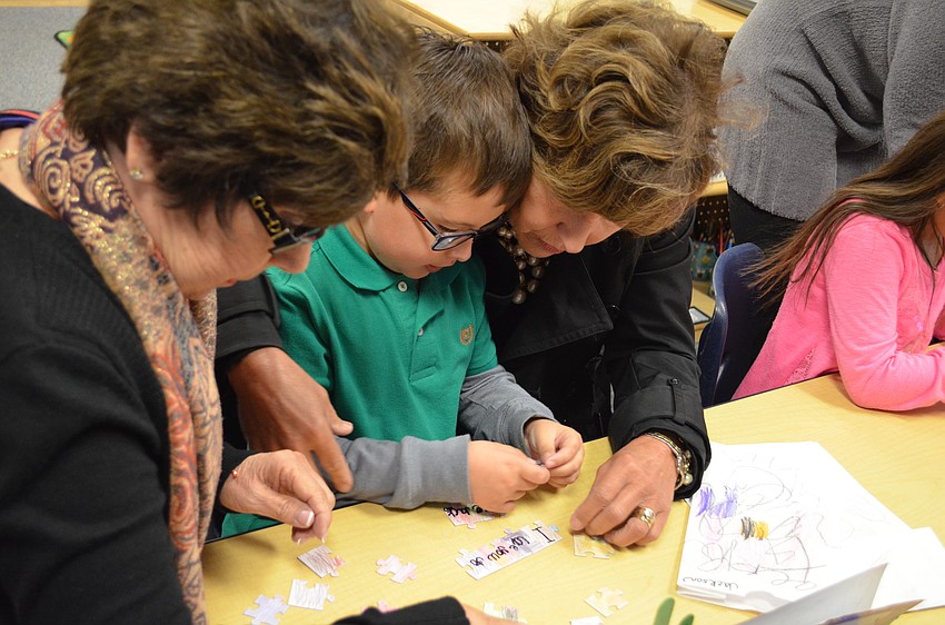 Jackson Bitsoff is surrounded by his grandmothers, Sandy Bitsoff and Elizabeth Fugazzi.