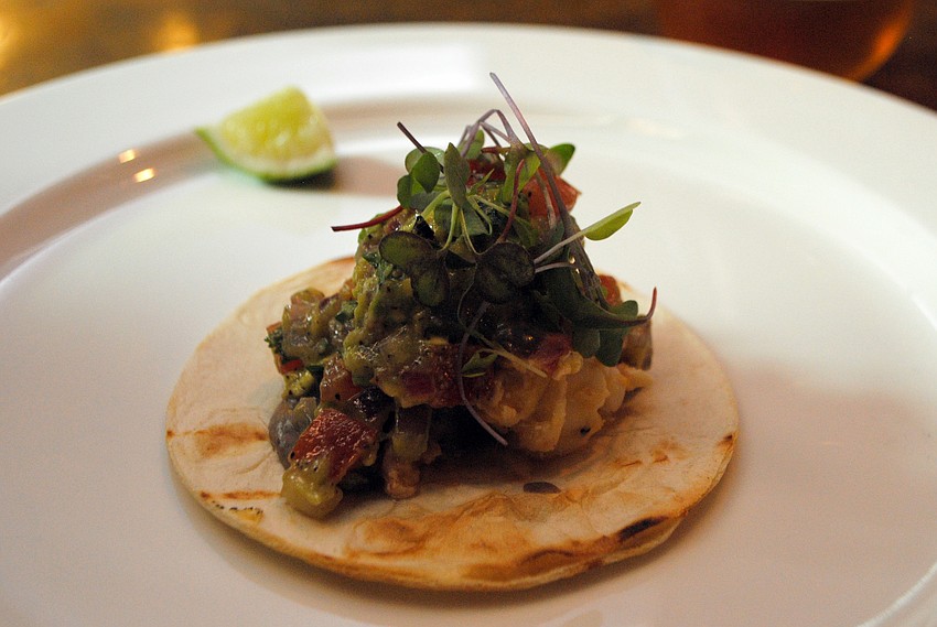 Second course: Yuzu-butter poached lobster taco paired with â€˜Invasion Pale Aleâ€™