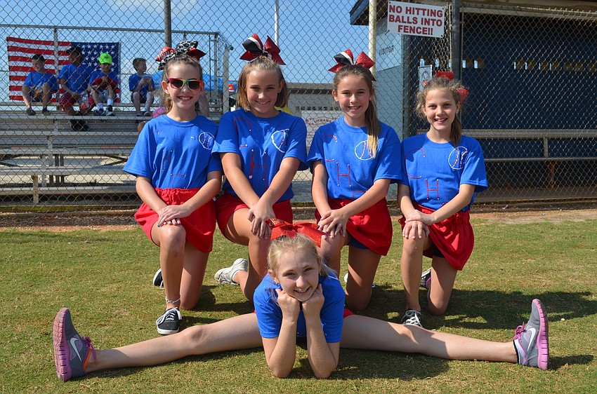 Madison Deal, Maddie Frye, Madison Magezino and Kendall Currul make up the Atlanta Braves cheerleading squad.