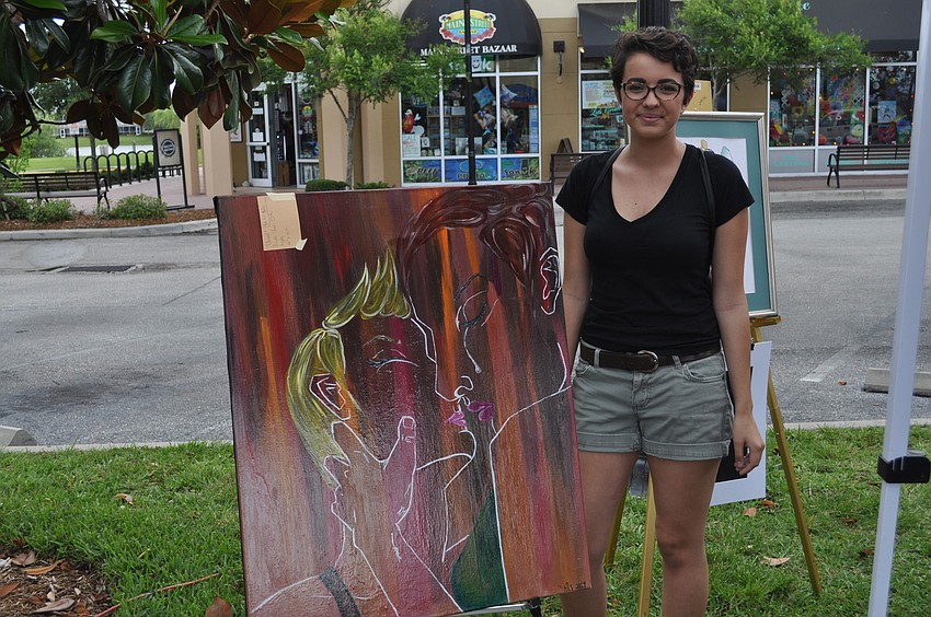 Nicole Shaw, a senior who will attend Memphis College of Art and Design, painted an acrylic piece.