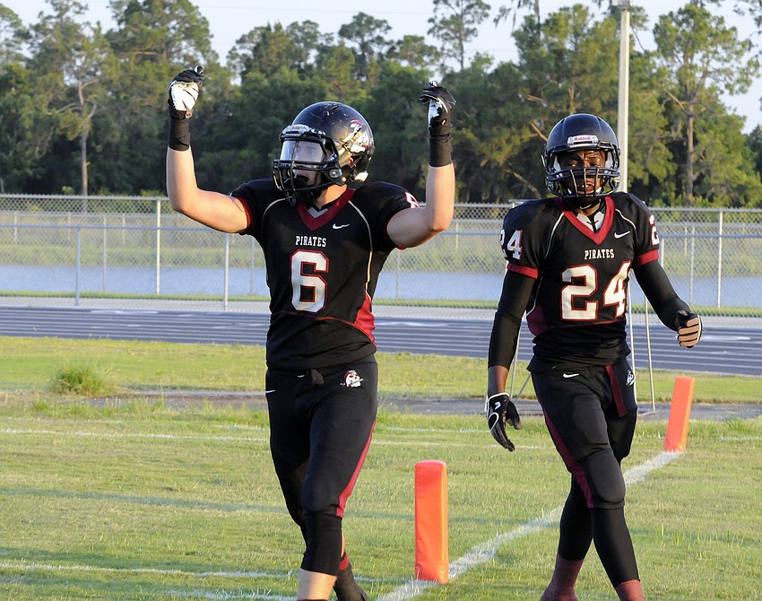 Braden River wide receiver Travis Williams celebrates following his 2-point conversion, which gave the Pirates an 8-0 lead.