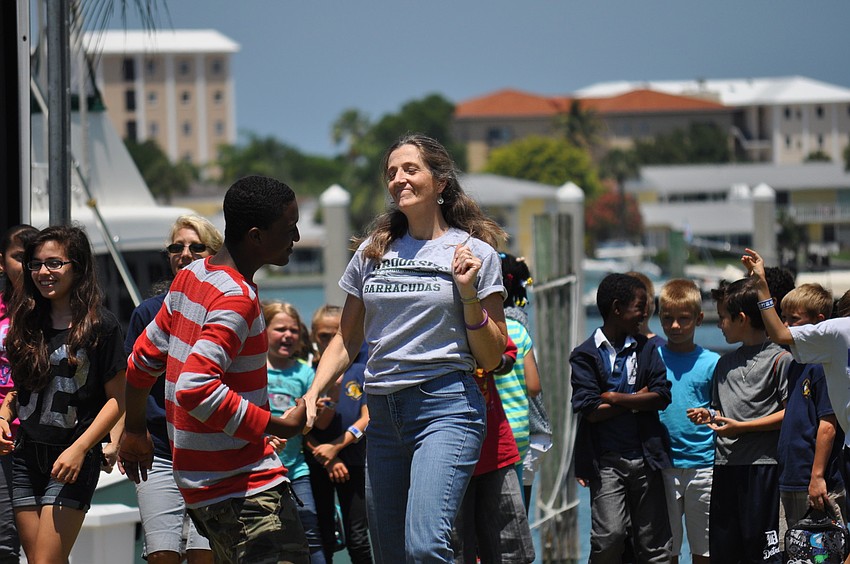 Laura Kleisshoeft dances with a student.