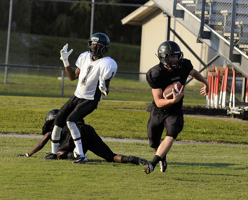Sarasota junior defensive back Tyler Thirion intercepts a pass in the end zone in the first quarter.