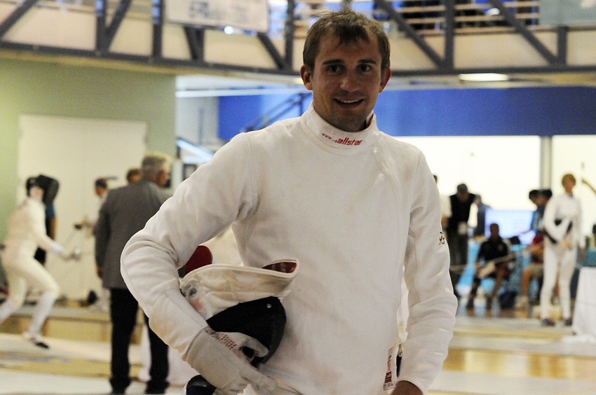 Russiaâ€™s Aleksander Lesun celebrates after winning his bout.