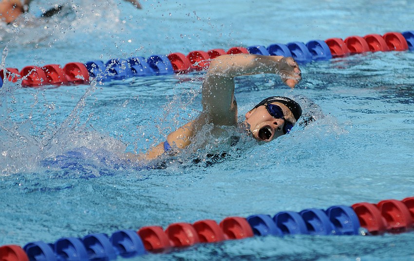 Barbora Kodedova of the Czech Republic completes the final 25 meters of her portion of the 200-meter freestyle mixed relay.