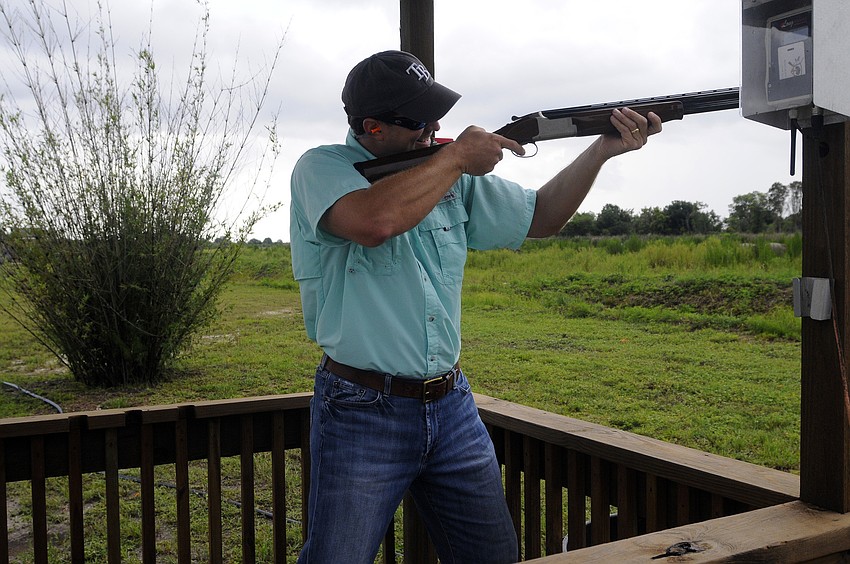 Jason Bartz of NDC Construction lines up what he hopes will be the perfect shot.