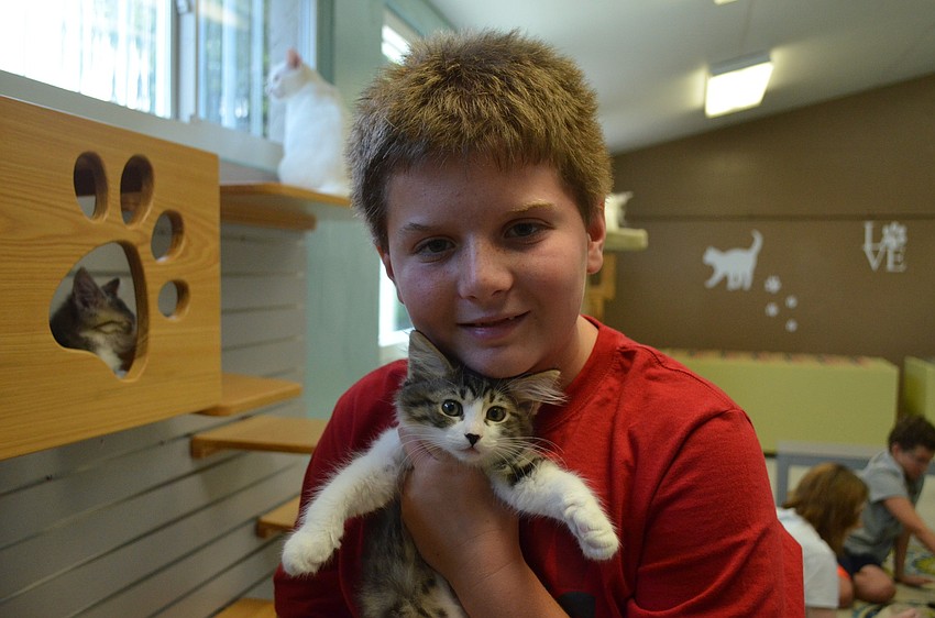 Nick Hefti plays with Smarty.