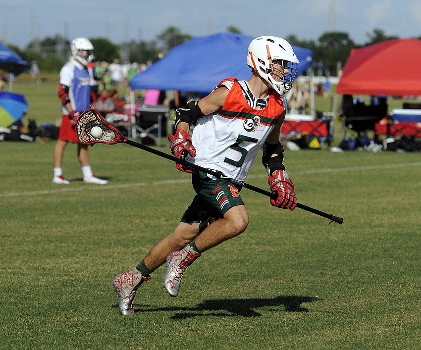 Cardinal Mooney junior Trey Snyder brings the ball up the field for the LB3 Monsters high school B team.