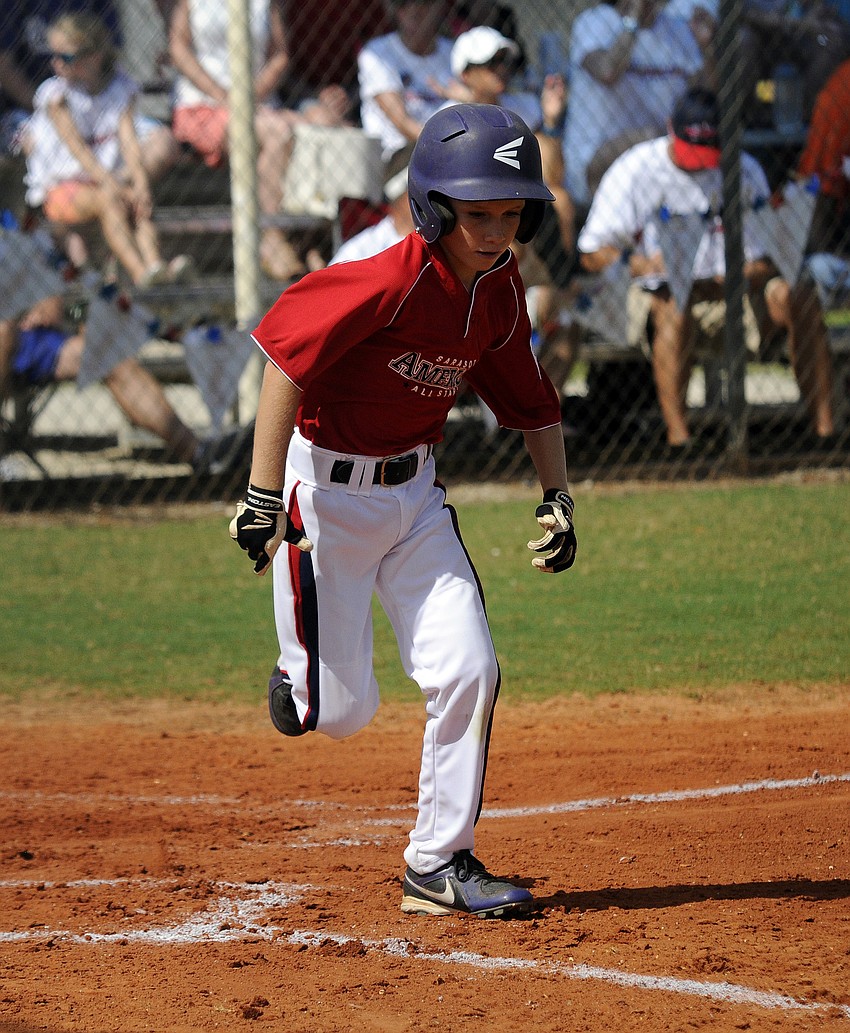 Austin Harford races down the first base line.