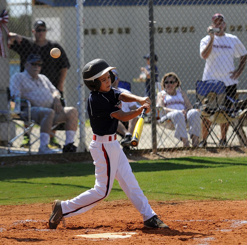 Sarasota National 10/11 All-Star Sean Quinlan fouls off a pitch.