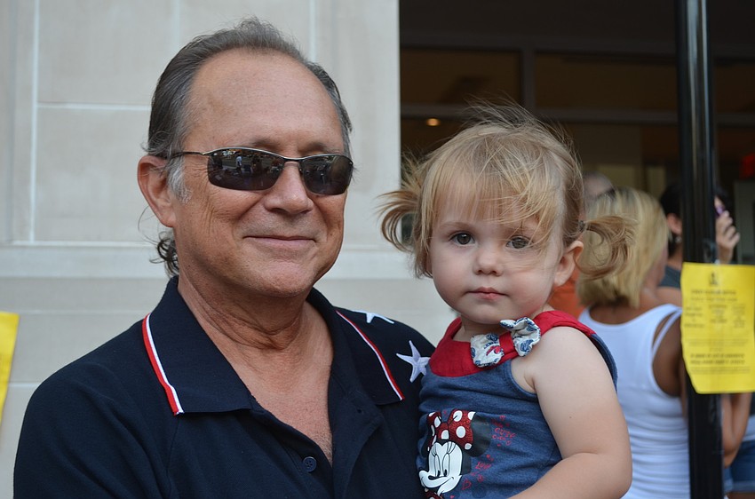 Bob Feather with granddaughter, Zoey.