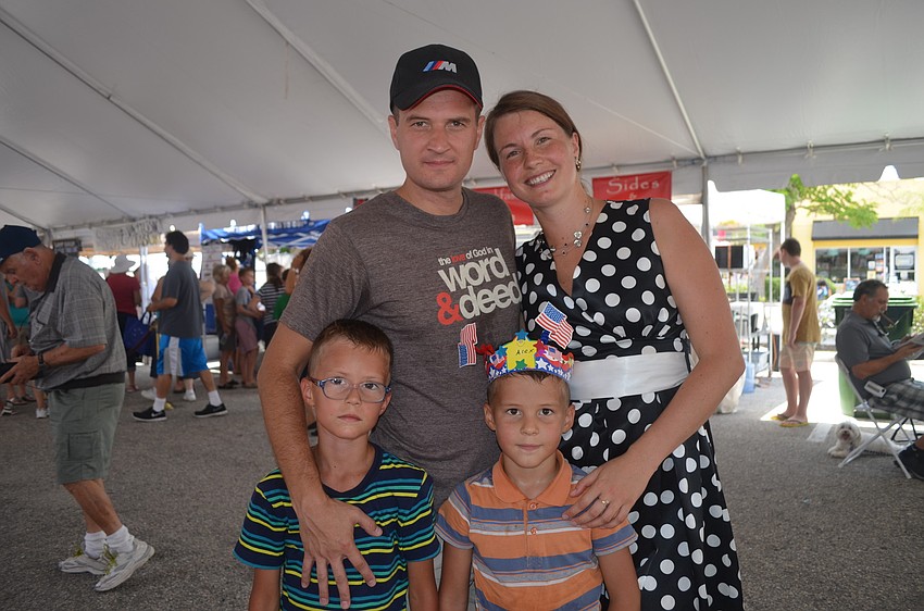 Alexey and Anastasiia Fraind with sons Alex and Ilia