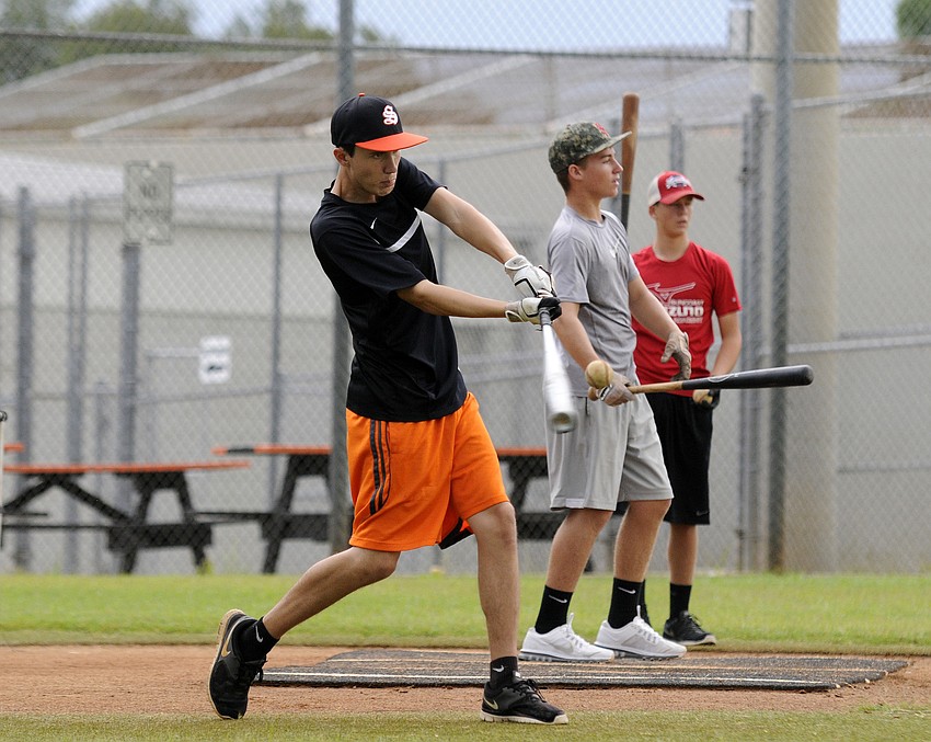 Sarasota High second baseman Lucas Beierlein makes contact during a hitting drill.