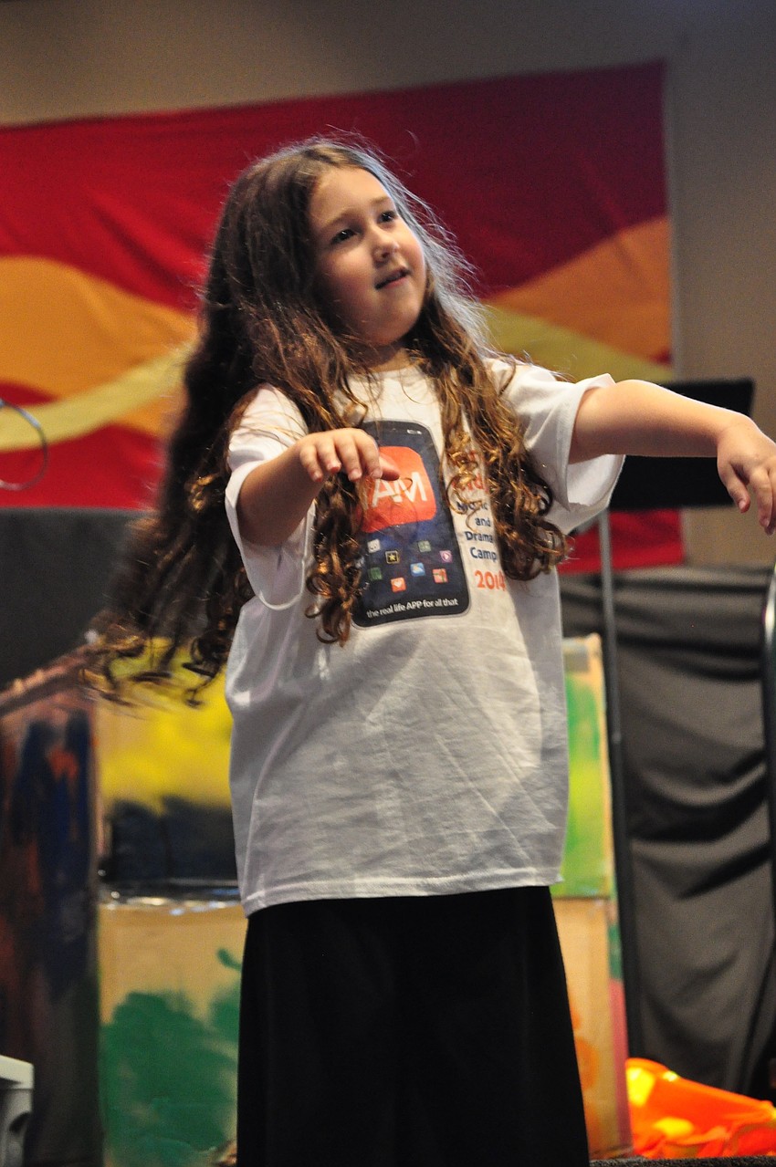 Kayla Barbosa pretends to be a zombie.