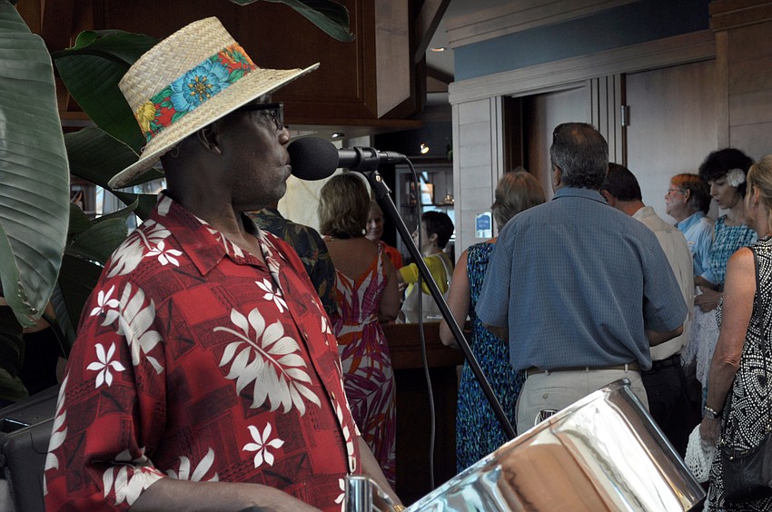 Clarence Brown played the steel drum during cocktail hour at the 4th annual Scallopalooza.