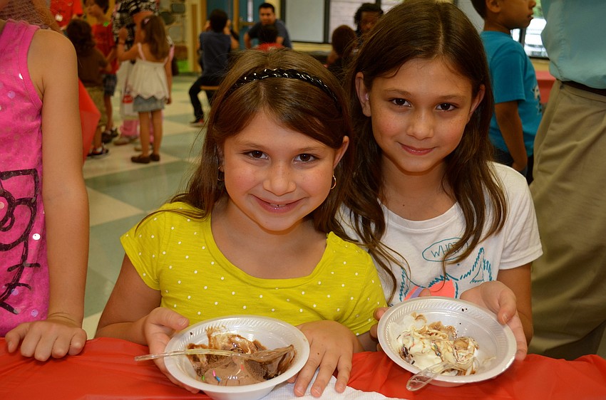 Bella and Gianna Talerico enjoy sweet treats.