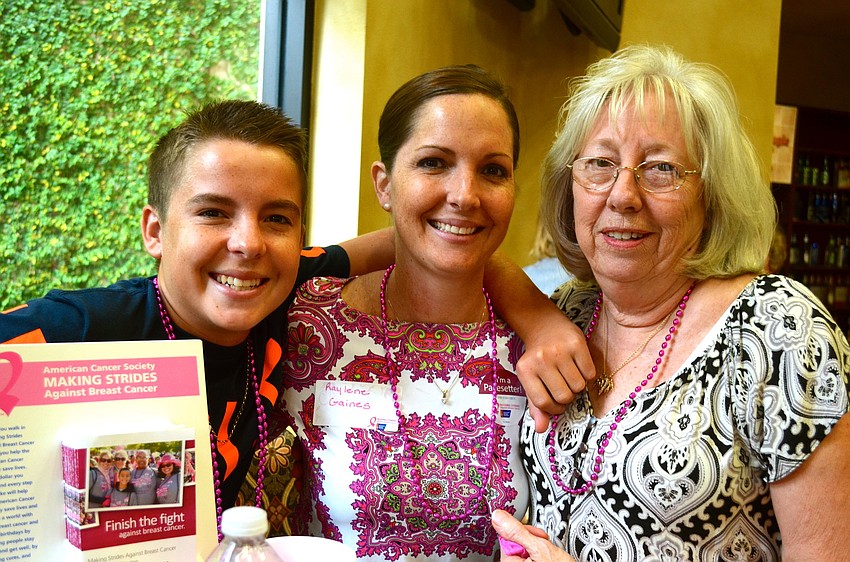 Shane and Raylene Gaines enjoy snacks with Margaret Bovinett.