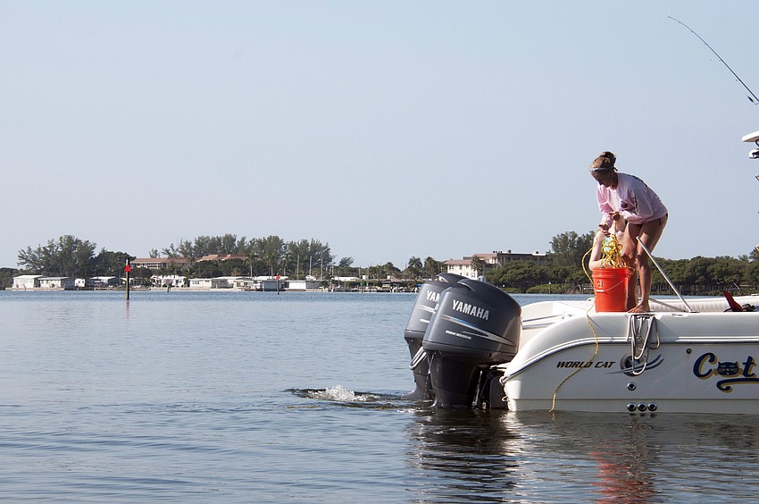 Ronda Ryan gets ready to start searching for scallops.