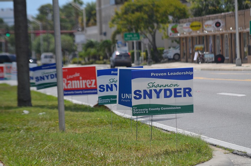 Campaign signs line Washington Boulevard.