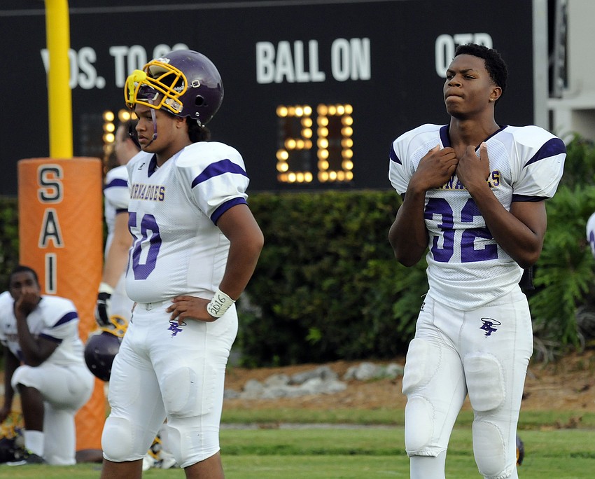 Booker Highâ€™s Izziah Donely and Vincent Sellars anxiously await to take the field against Sarasota in the Tornadoes season opener Aug. 29.