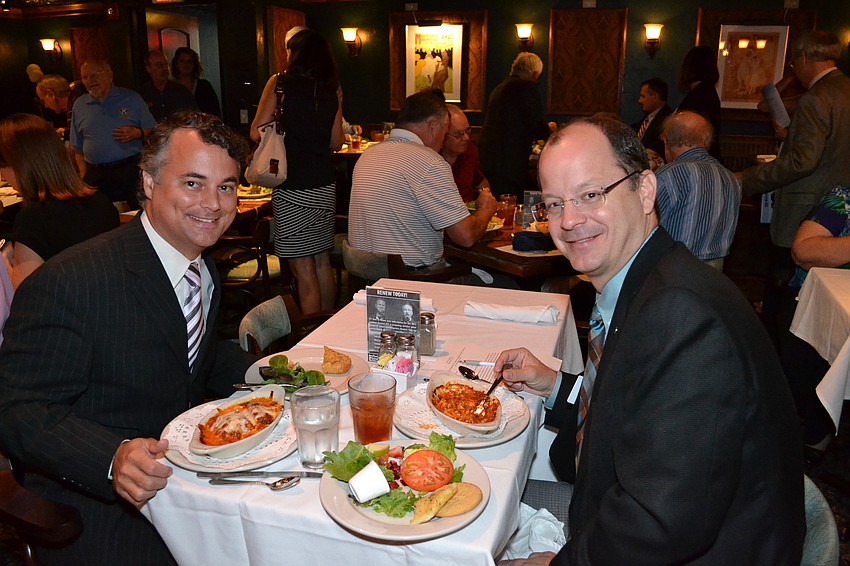 Paul Gardner and Kiwanis Club President John Moore.