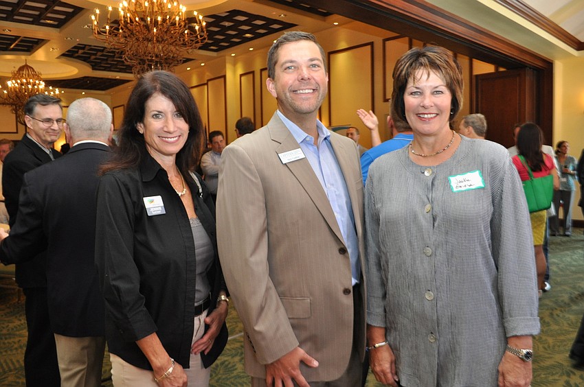 Jennie Lucier, of Alltrust, with Nick Feather, of Capstan Financial Group, and Jackie Griese, of Northwestern Mutual
