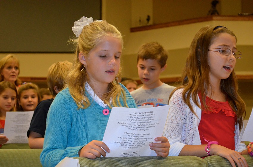 Kristen Allison and Summer Roland sing along.