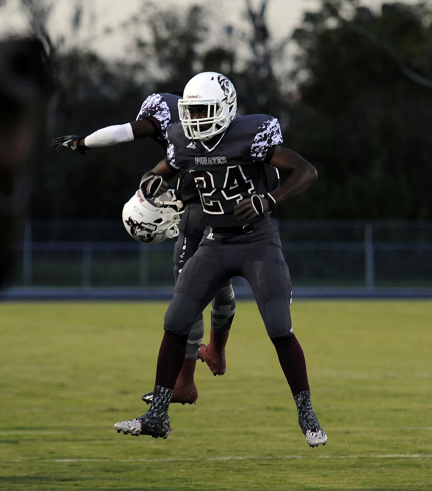 Braden River running back Carlos Crawford celebrates with a teammate following his 15-yard touchdown run in the first quarter.