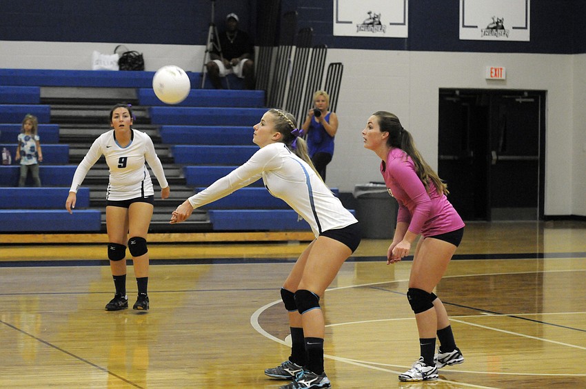 ODA senior Natalie Buffett passes the ball toward the net.
