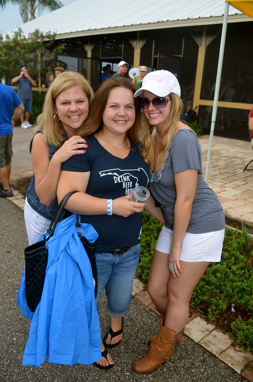 Maria Sarver enjoys beer with Lexi and Shana Coulthurst.
