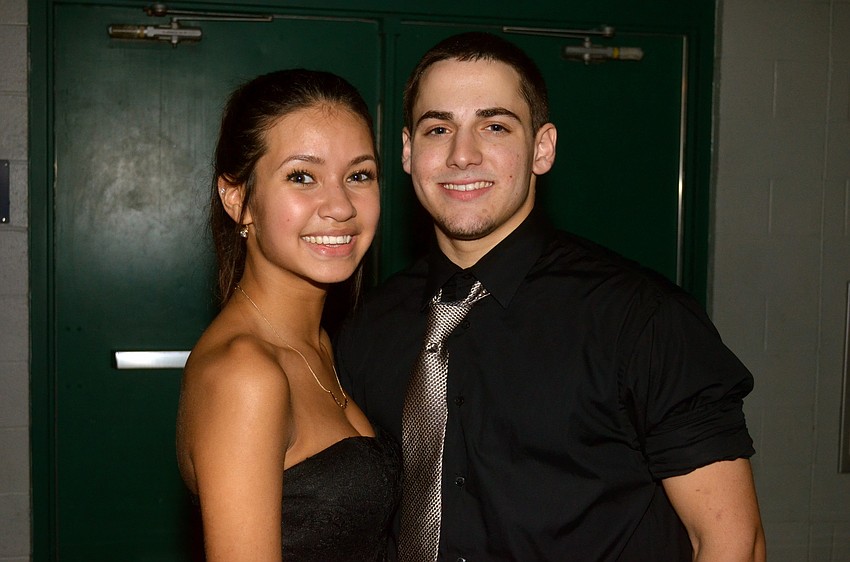 Kaylah DaCosta and Renzo Christiano stop dancing for a picture.