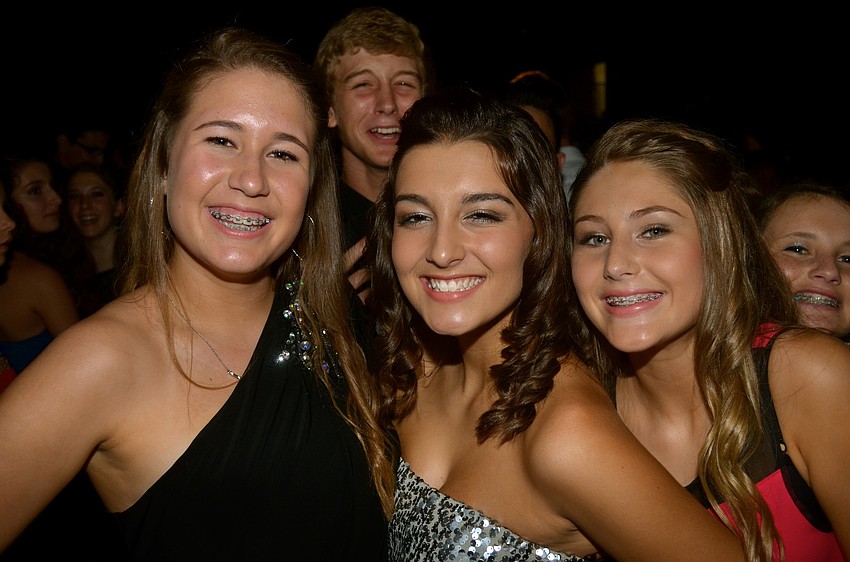 Kylie Duquette, Tommilyn Tharpe and Kendall Wilson wear matching smiles.