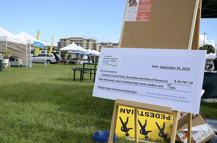 The Phillippi Farmhouse Market donated $60,767.10 to the county to help restore the historic farmhouse on the estate.