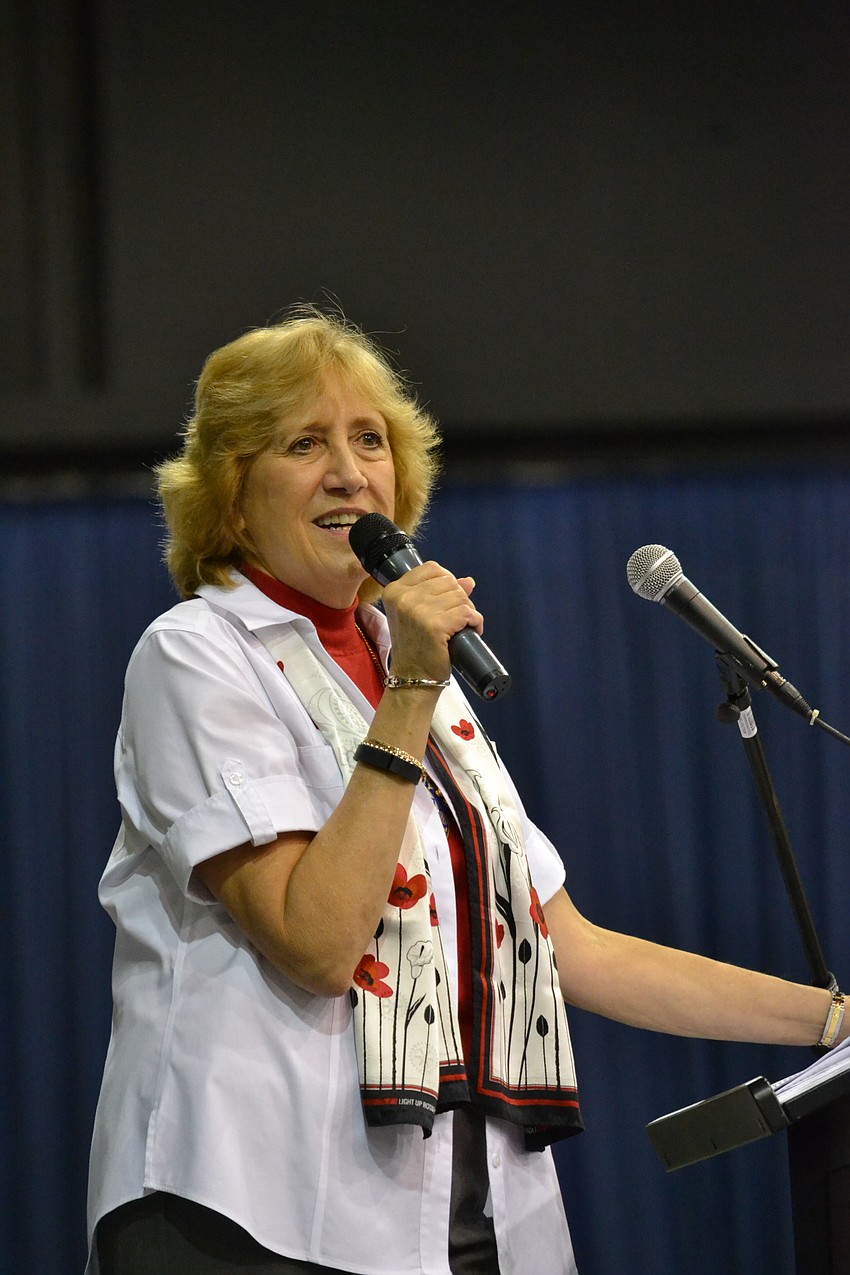 Sarasota Rotary Club President, Judy Bennett welcomes attendees to the 40th Annual Pioneer Day Picnic at Robarts Arena.