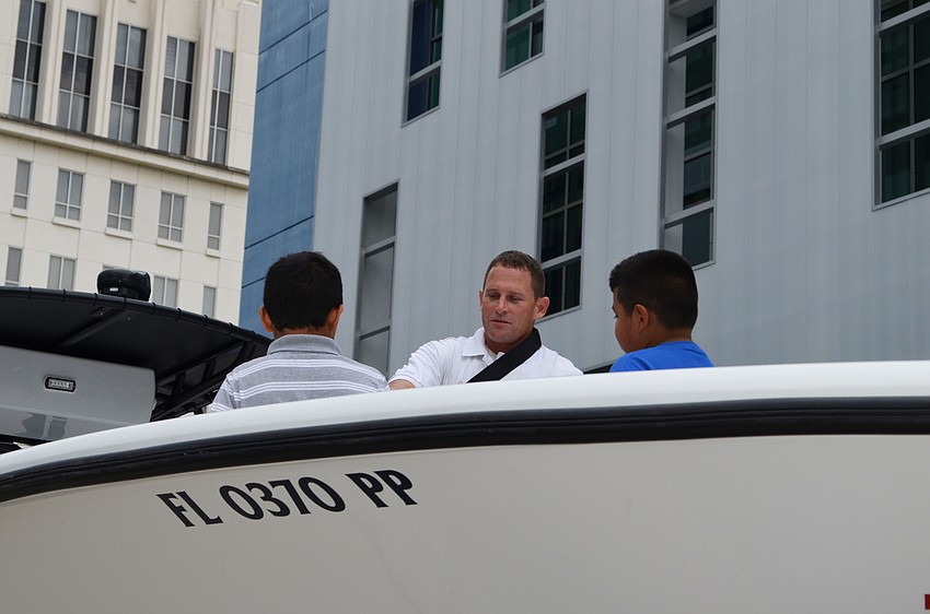 Marine Patrol Officer Bruce King gives tours of the Sarasota Police boat.