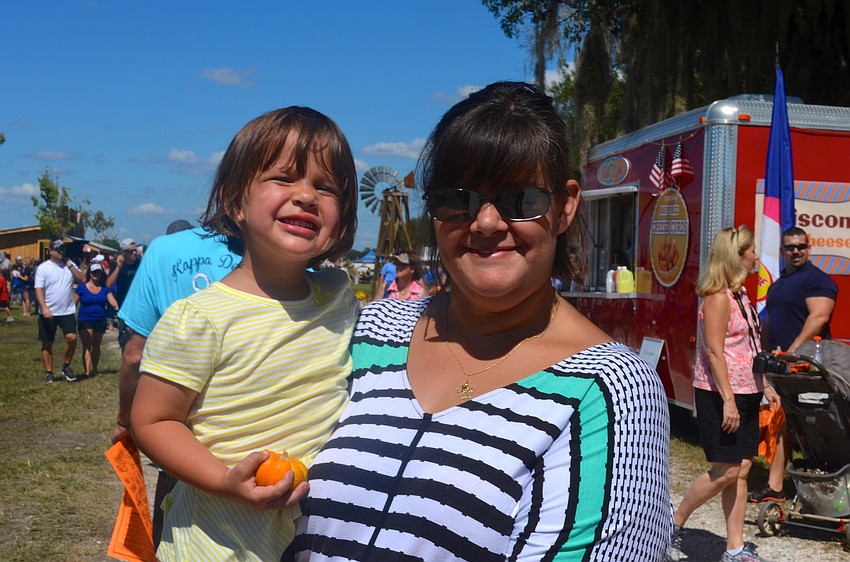 Caitlyn and Jennifer Dischinger enjoy the dayâ€™s festivities. â€”