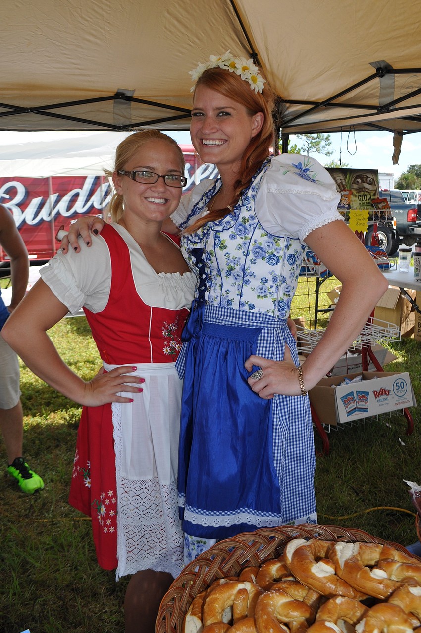 Cheyenne Schwind and Nakita Geier serve food from Geier Sausage Kitchen.