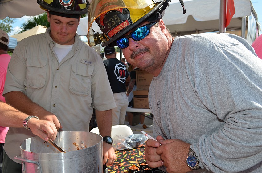 Mike Dâ€™Angelo takes credit for the recipe and cooking for the Boca Grande Fire Department chili entry.