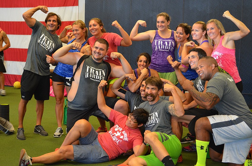 Competitors flex following the competition.