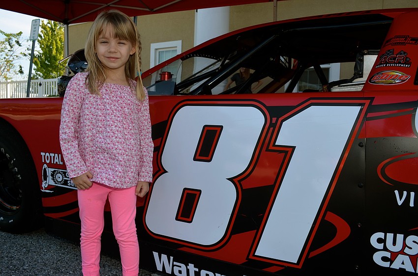 Jaime Kelley prefers to look at the race car from outside rather than from the driver's seat.