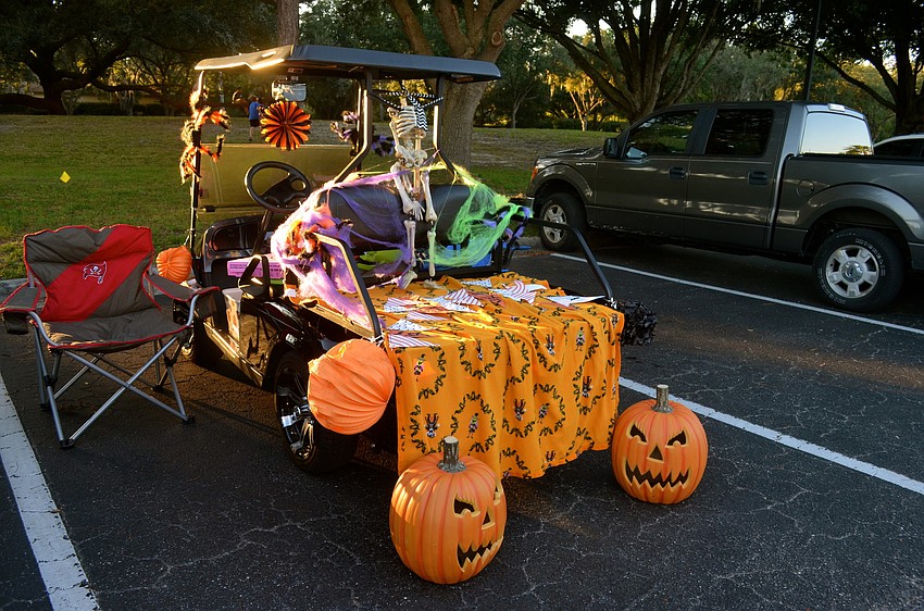 Parents decorated golf carts and family vehicles for the event.