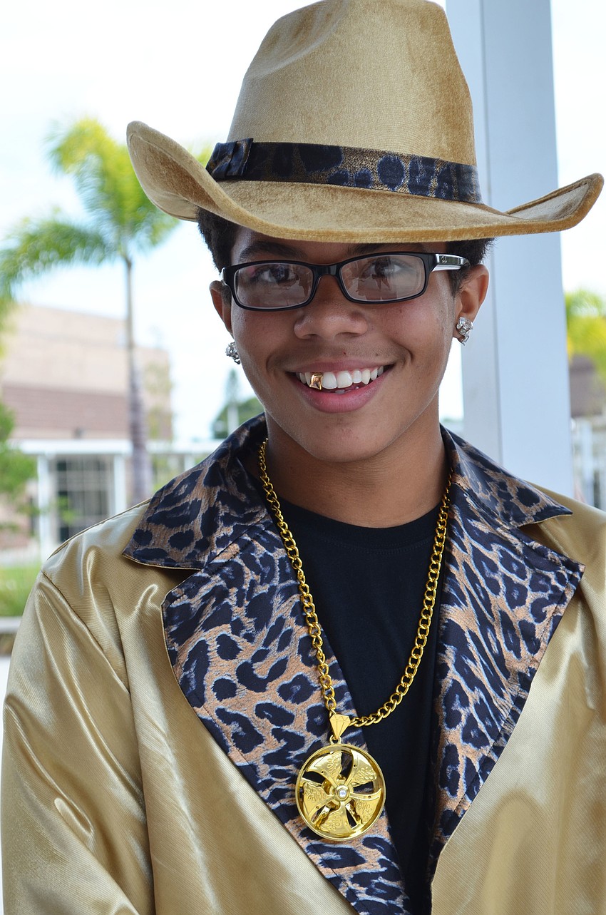 Henley Connor decked out in gold for Throwback Thursday at Booker High School.
