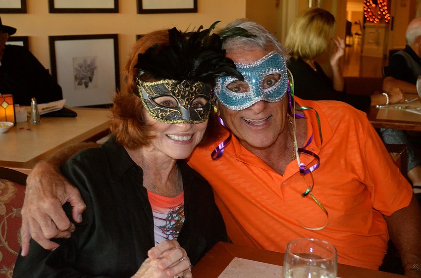 Marsha Wright and Ken Hawthorne enjoy dinner out with friends.