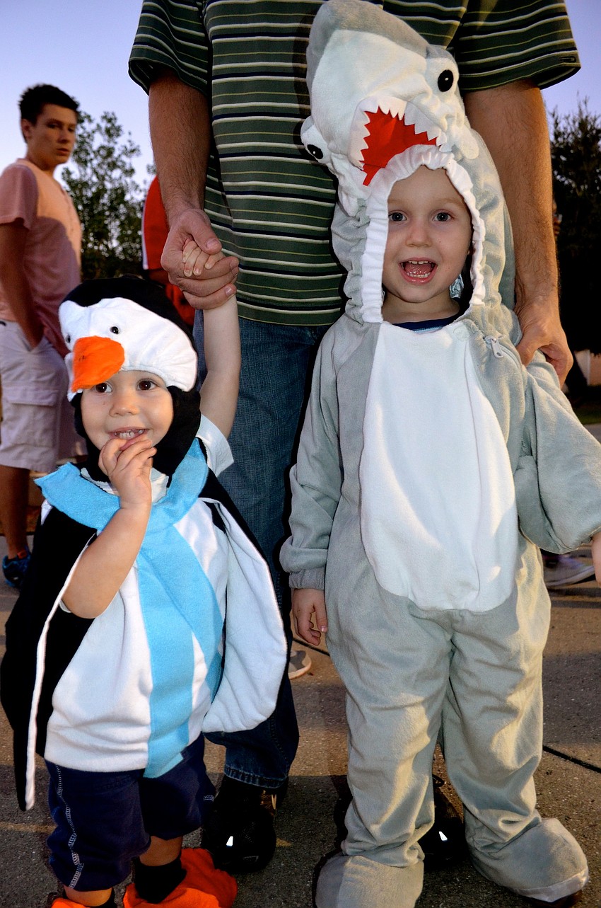 Brothers Isaac and Christopher Rosile dress as animals they like.