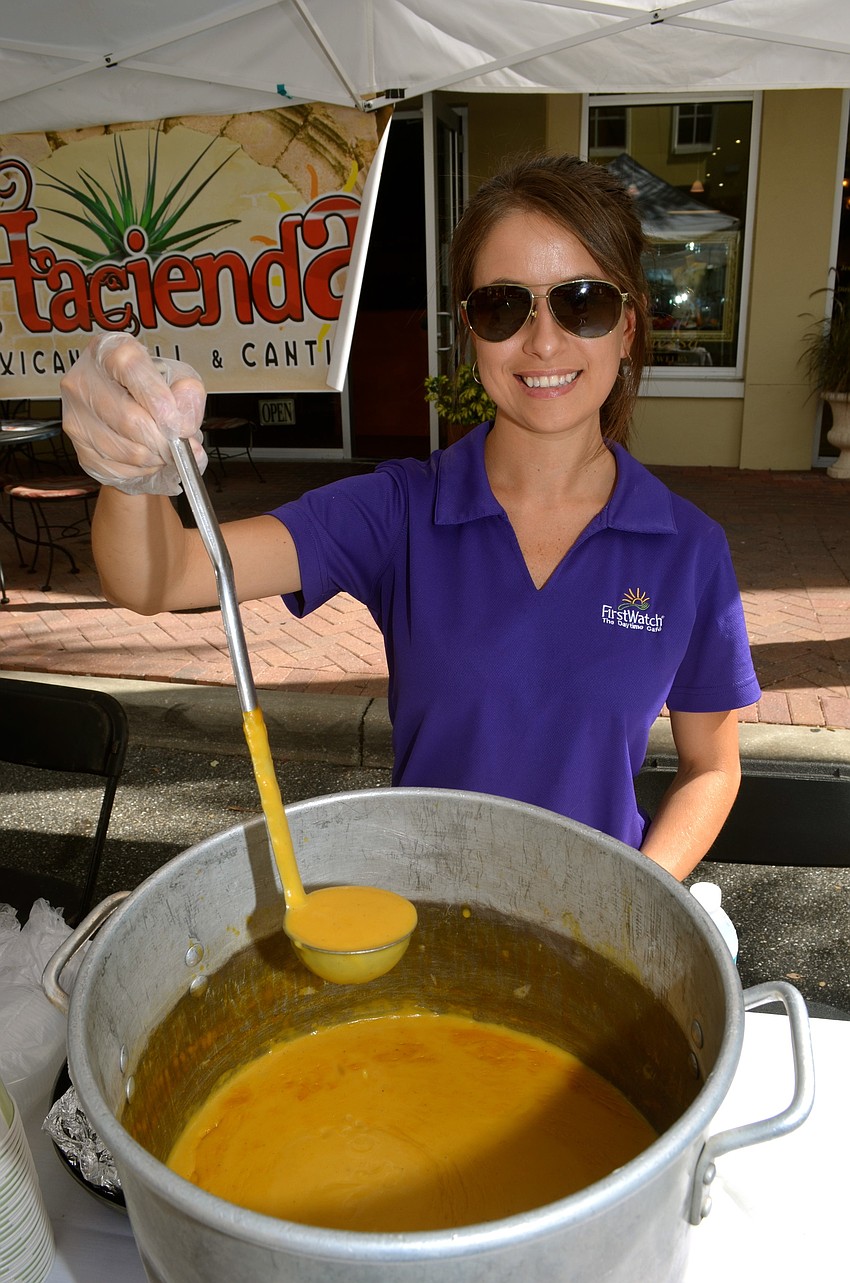 Anna Beldycki, of First Watch, serves a hot treat on a warm day.