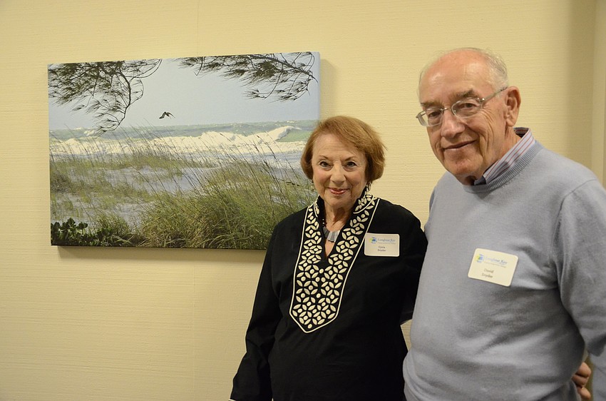 David Snyder and Cyvia Snyder purchased this canvas print Friday evening. Louis Cabot donated 60% of his print sales to funding for a digital photography studio at the Longboat Center for the Arts.