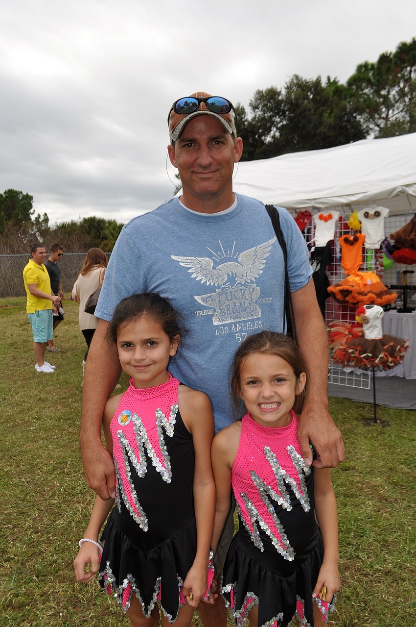 Jade Kruse has fun with her dad, Jon, and sister, Sadie, 6.