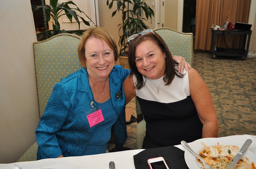 Linda Honeycheck and Linda Donnelly, of both of University Park, sell tickets.