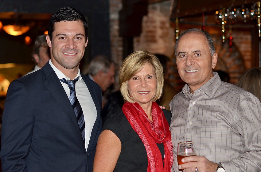 Matt Cornelius with Denise and John Saputo